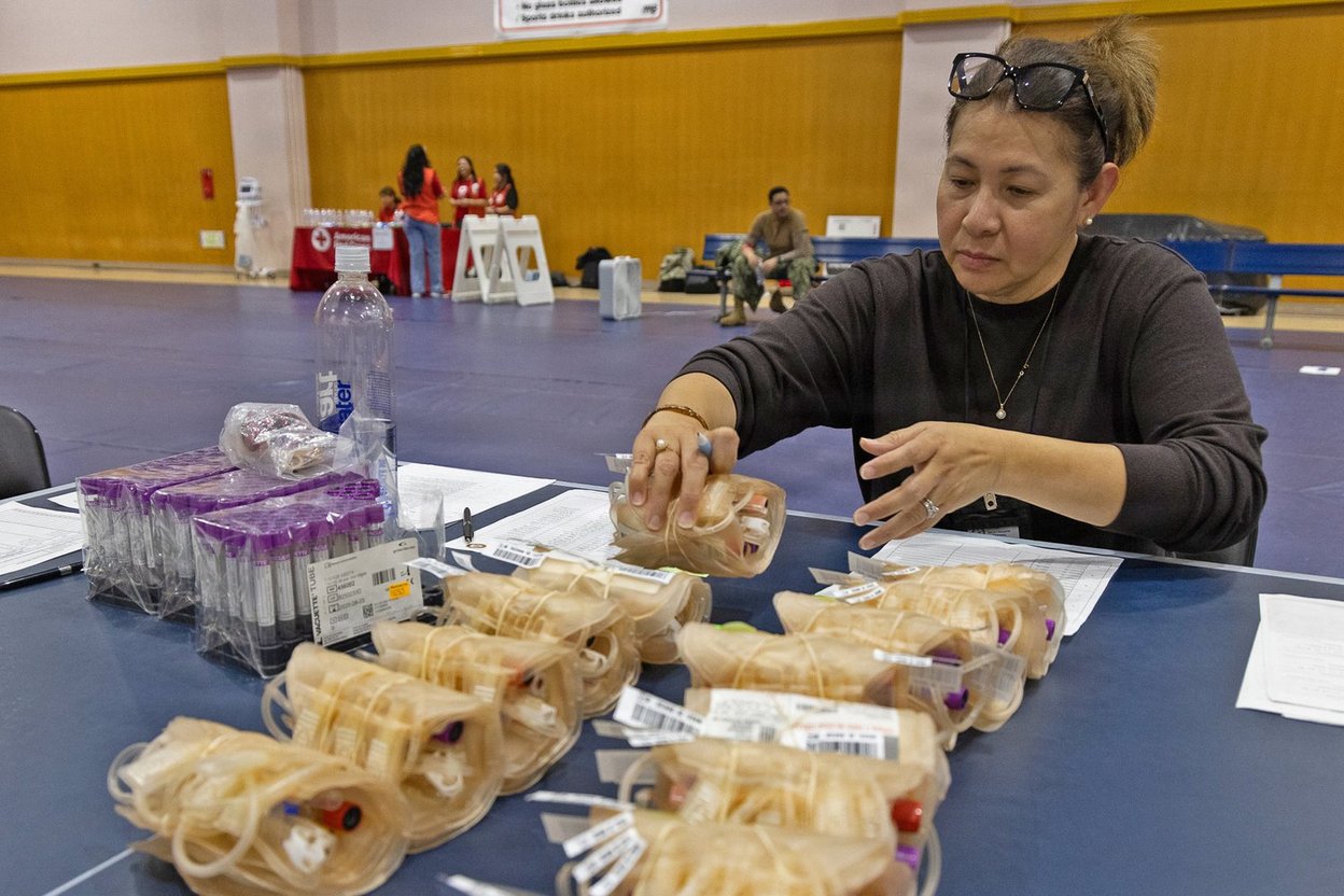 Blood bags being handled at a blood drive