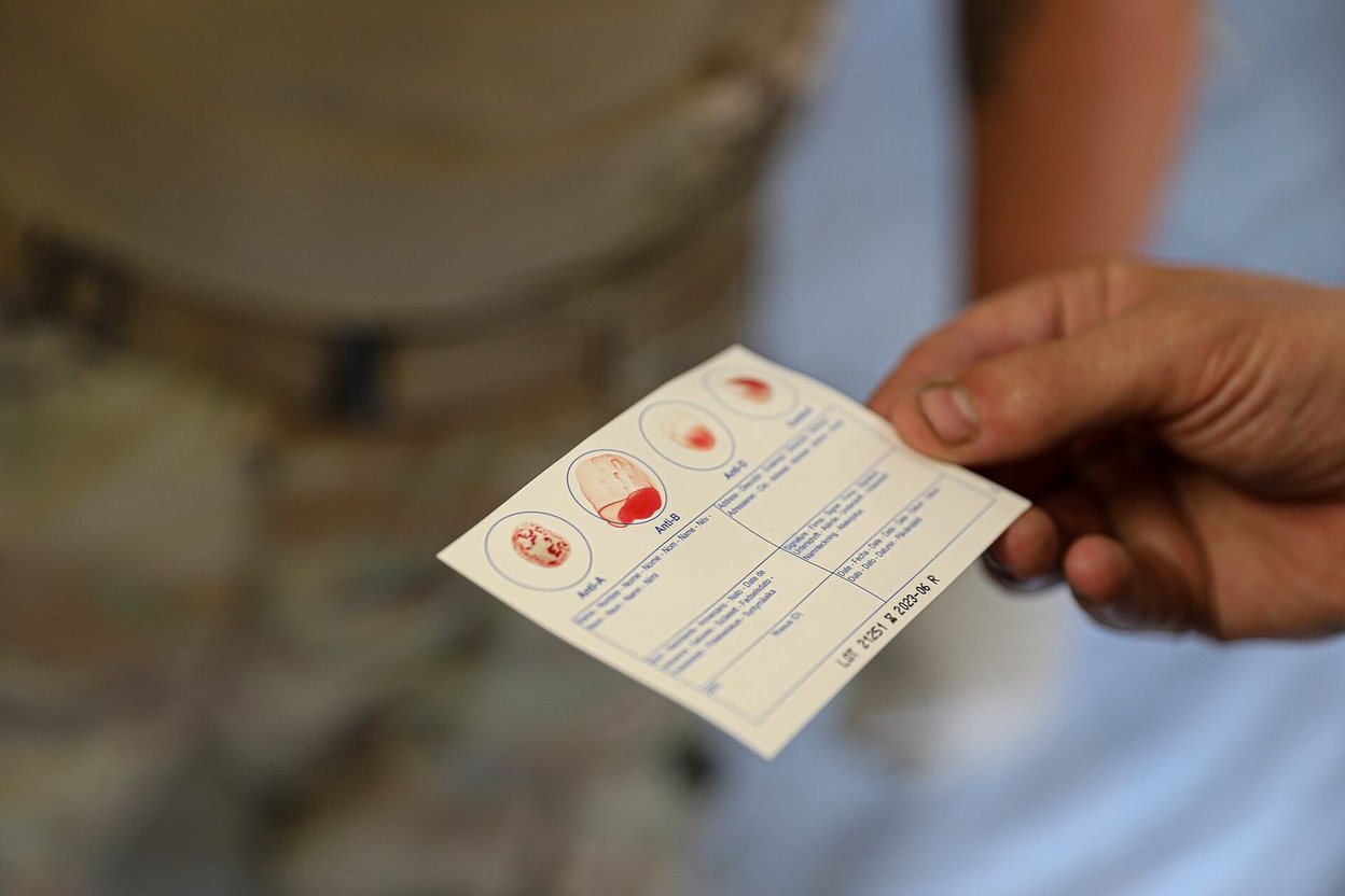 Army medics drawing blood during walking blood bank training